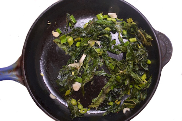 Stinging Nettles Cooked in a Pan with Spring Garlic