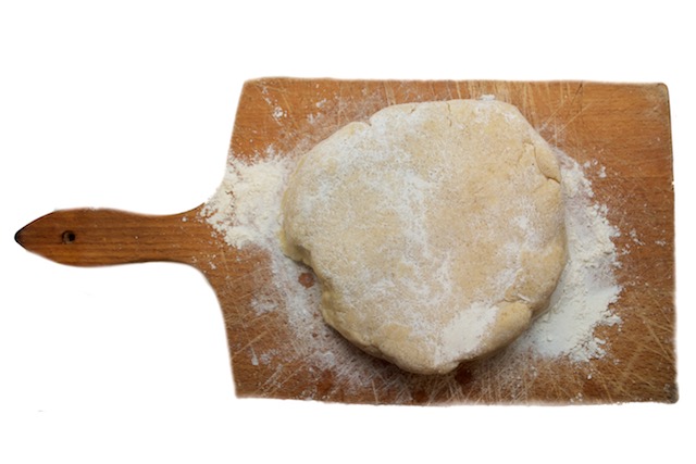 Dough Shaped in Disk on Floured Board for
                     Raspberry Tart Recipe