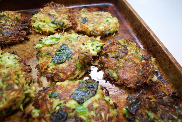 Zucchini fennel fritters on a baking seet