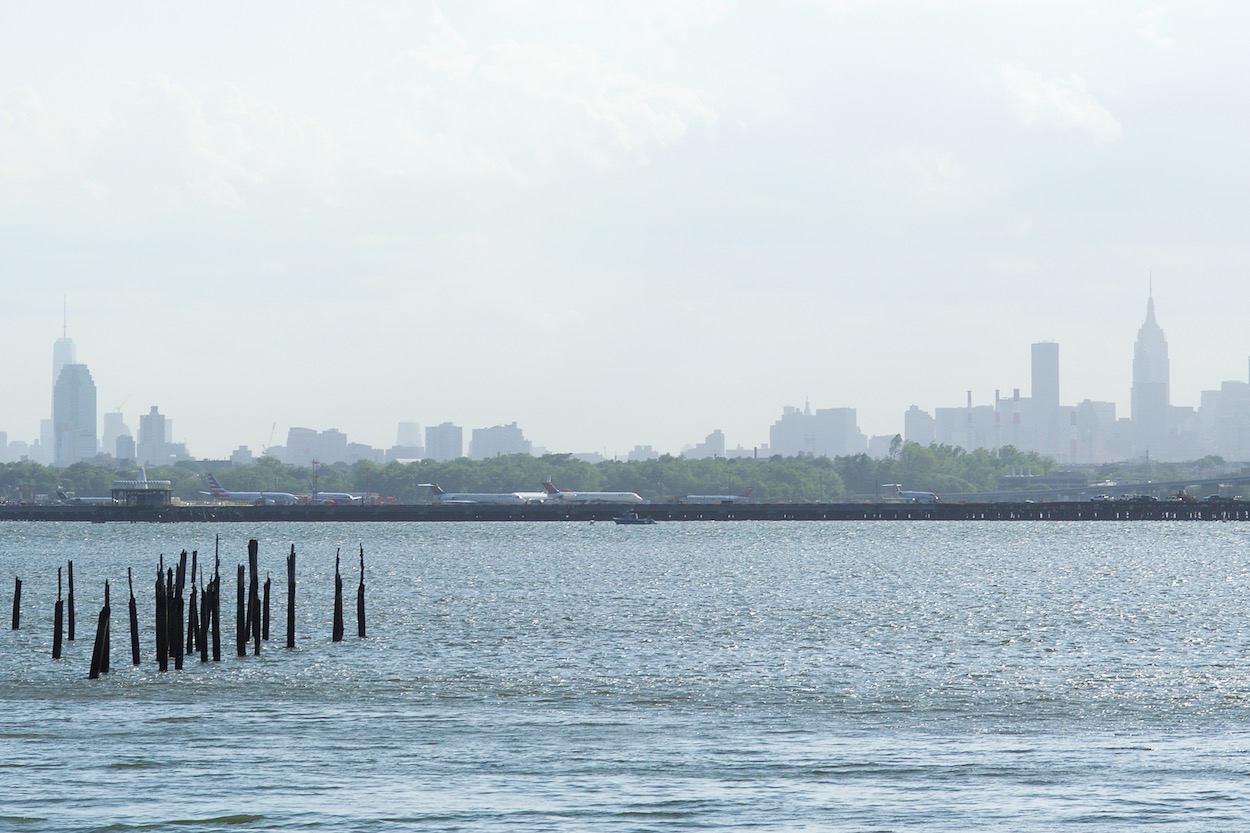 View of Manhattan skyline from Hermon A. Macneil Park in College Point