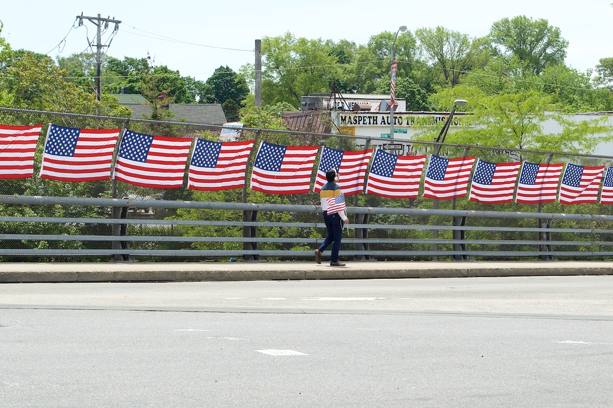 Flags along Grand Avenue for the Maspeth
                     Memorial Day parade