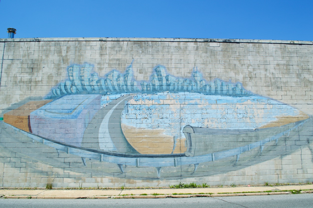 NYC Street Mural in blue and tan in Rockaway, Queens