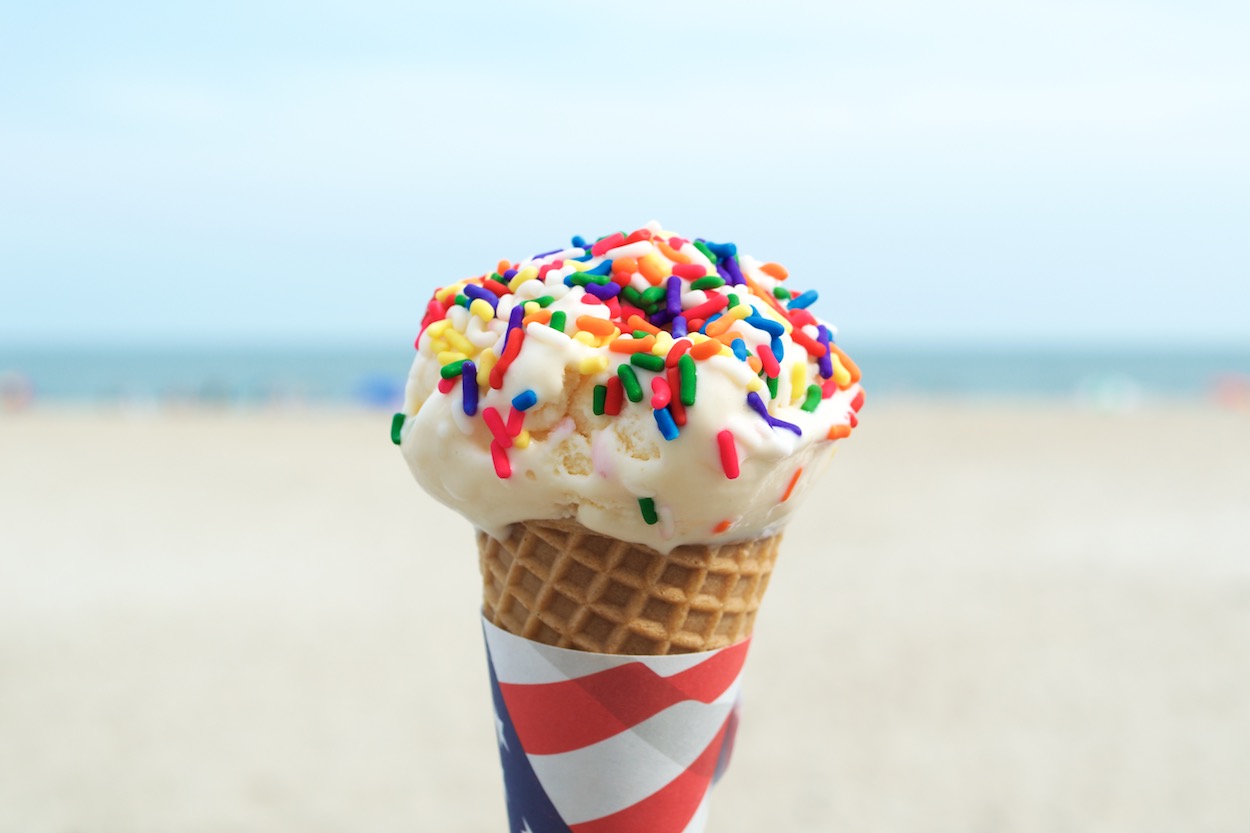 Closeup of a Vanilla Ice Cream Cone with Rockaway Beach as the Backdrop