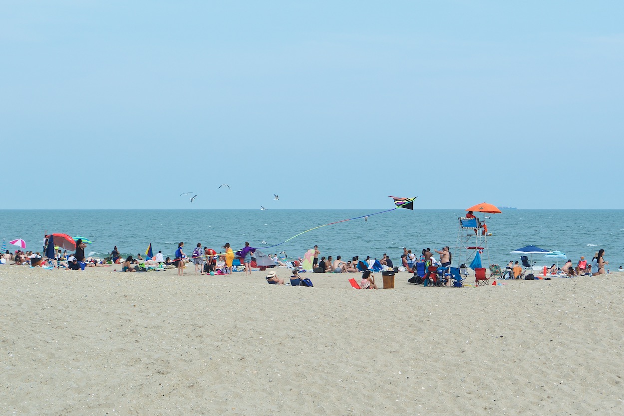 Rockaway Beach in the Summer, with sand, kite and seagulls