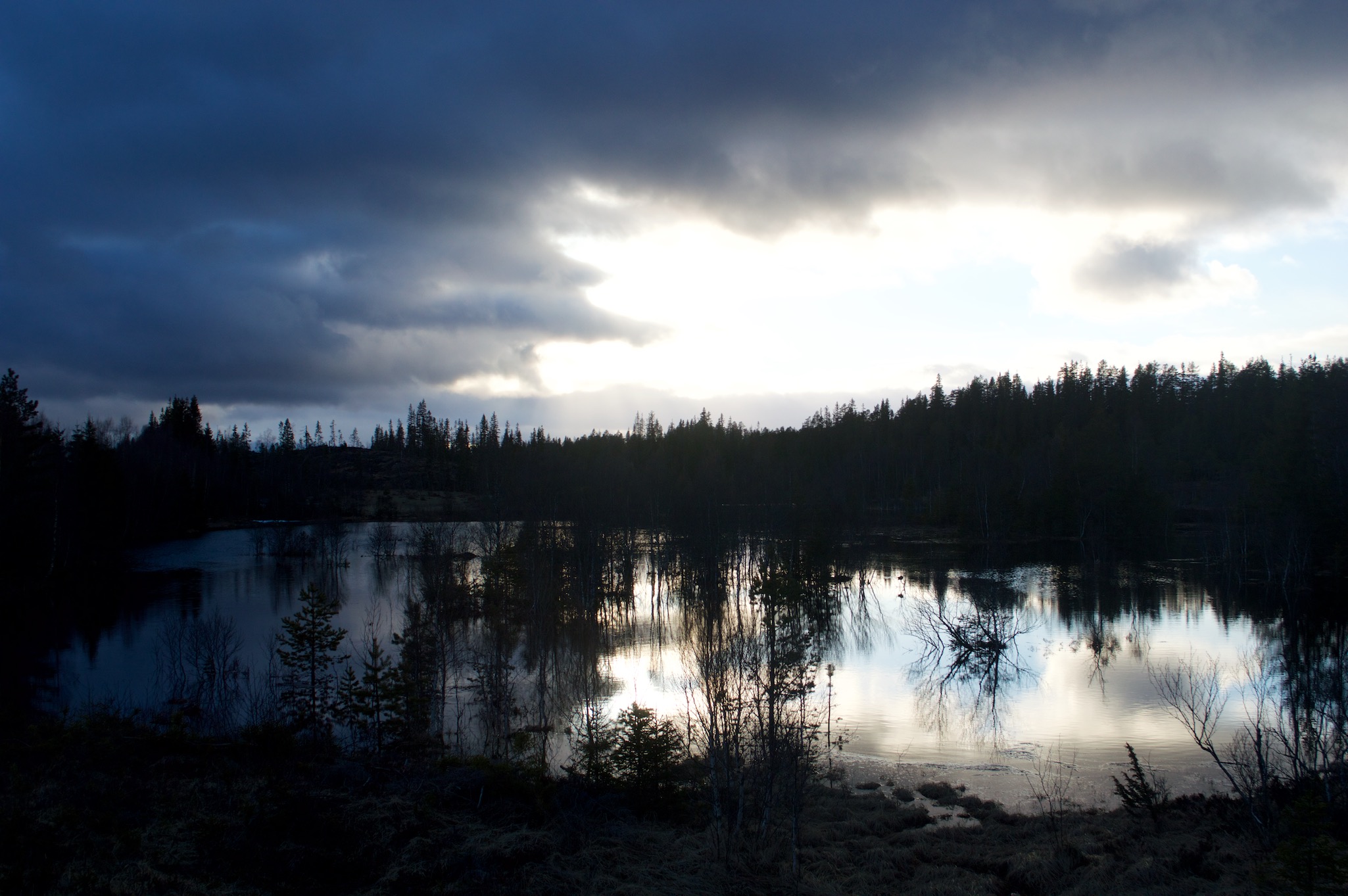 Sun setting over lake in Fosen, Norway