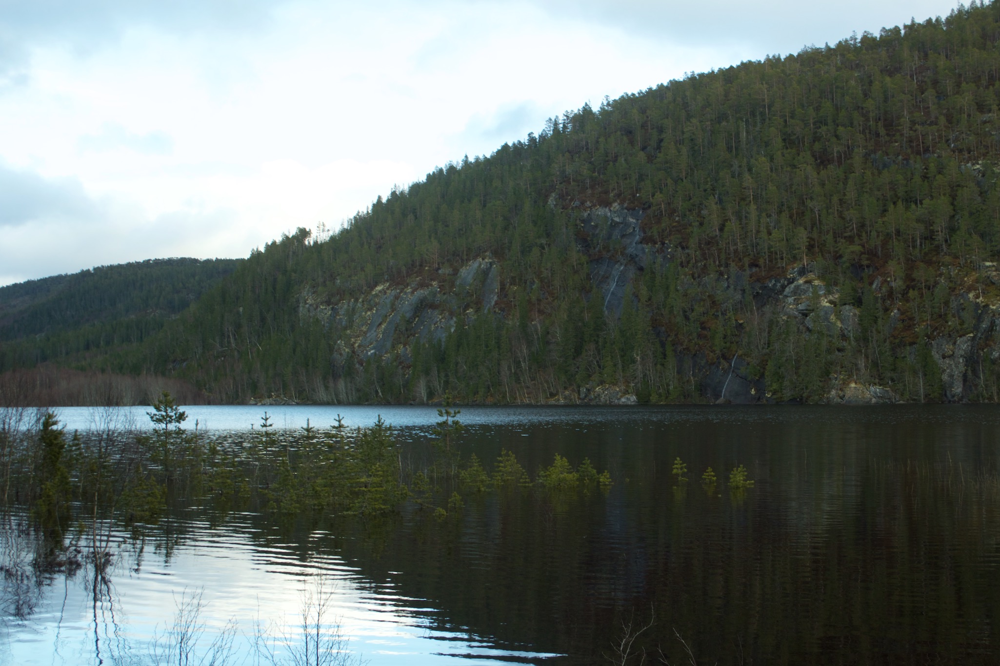 Reflection of mountain in lake in Fosen, Norway
