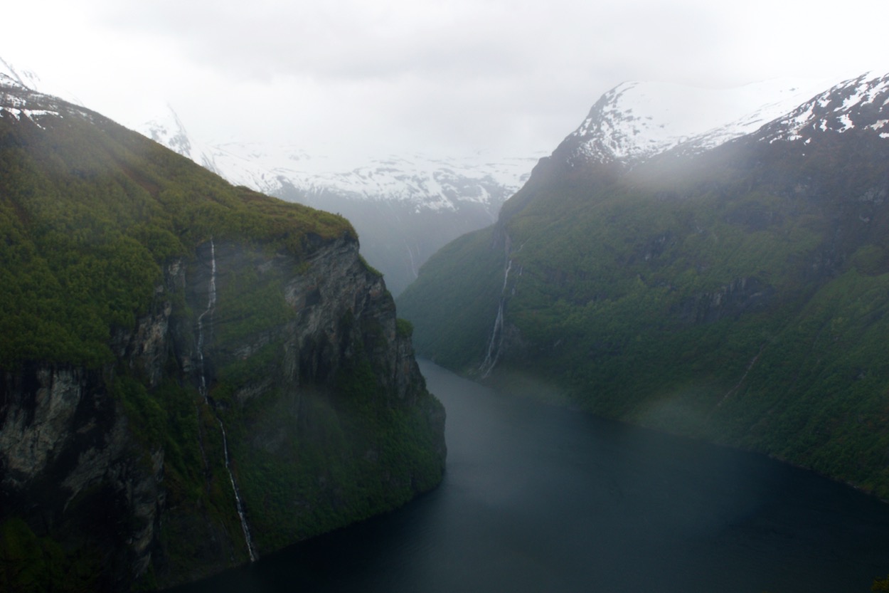 View looking down over the mountains and fjord in Geiranger, Norway