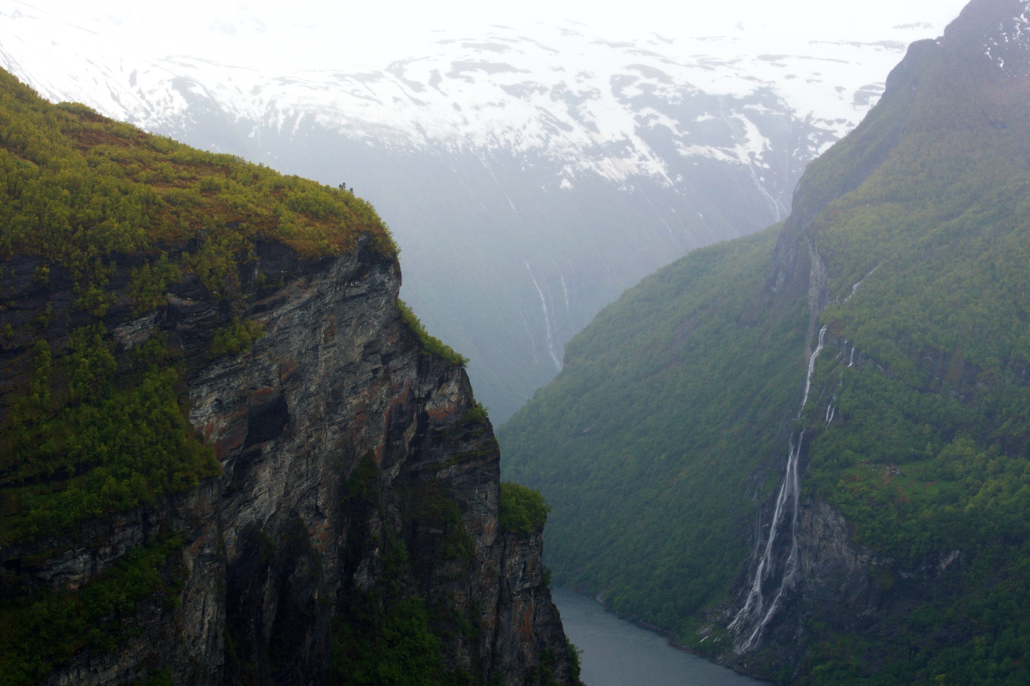 View looking down over the mountains and fjord in Geiranger, Norway