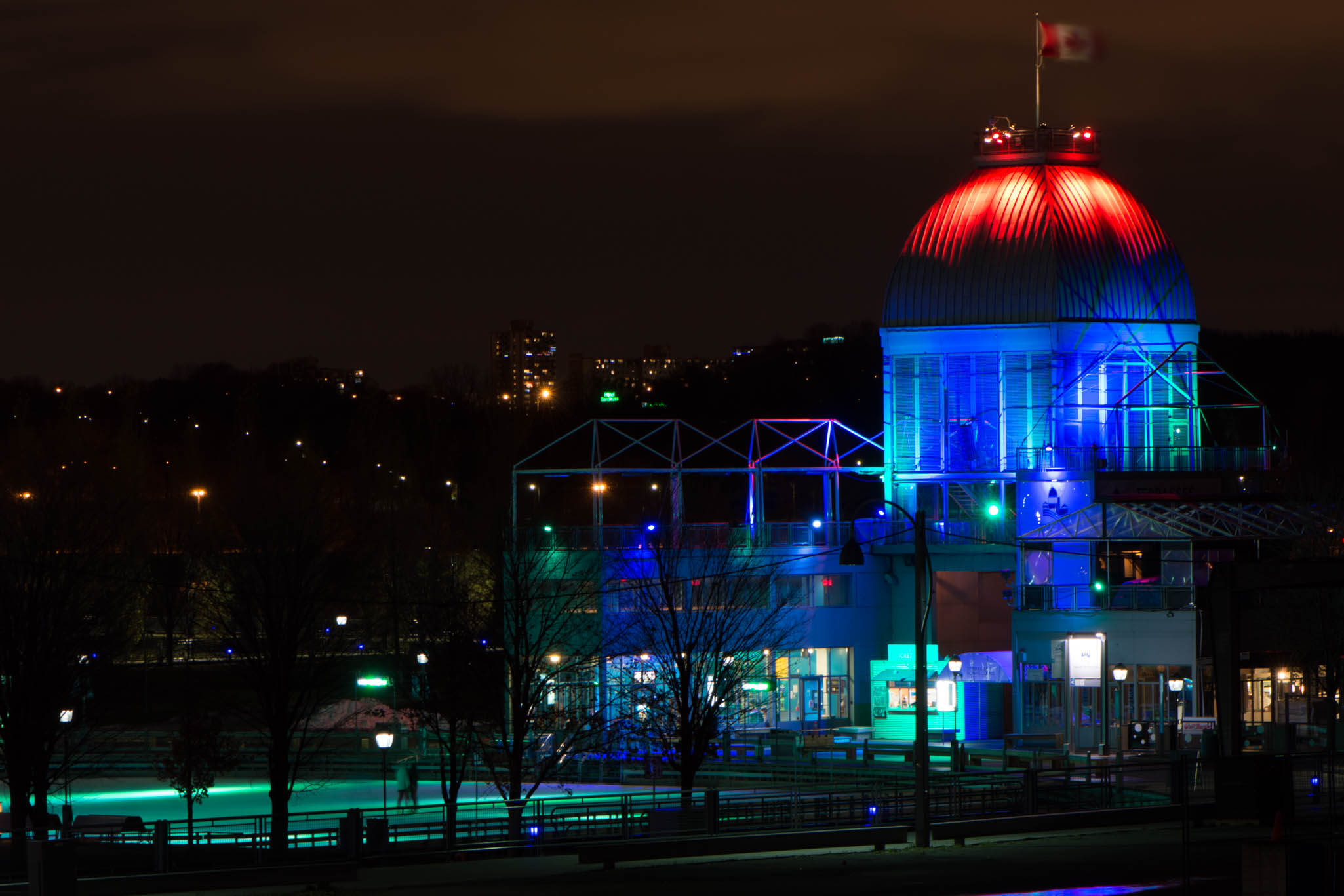 Ice Skating in Bonsecours Basin and Marche Bonsecours at Night from the Old Port in Montreal, Canada