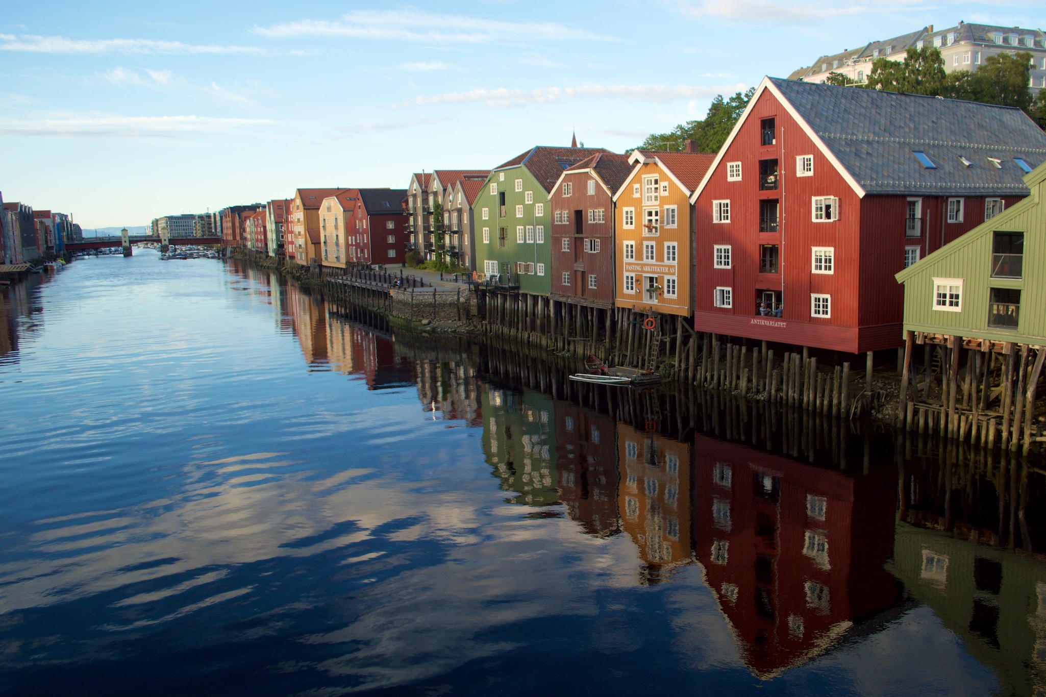 Colored wooden houses along the River Nidelven in Trondheim, Norway