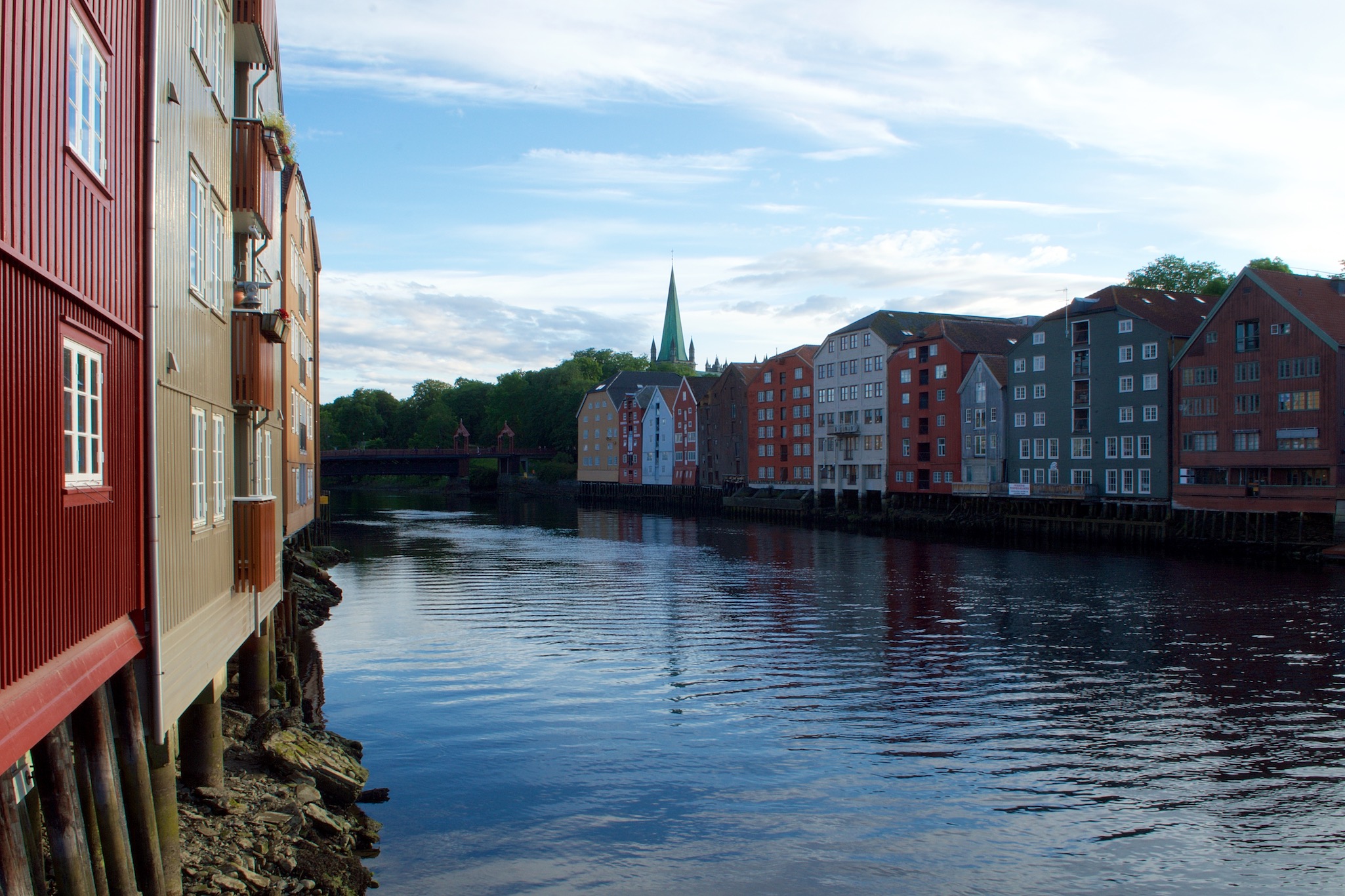 Colored wooden houses along the River Nidelven in Trondheim, Norway
