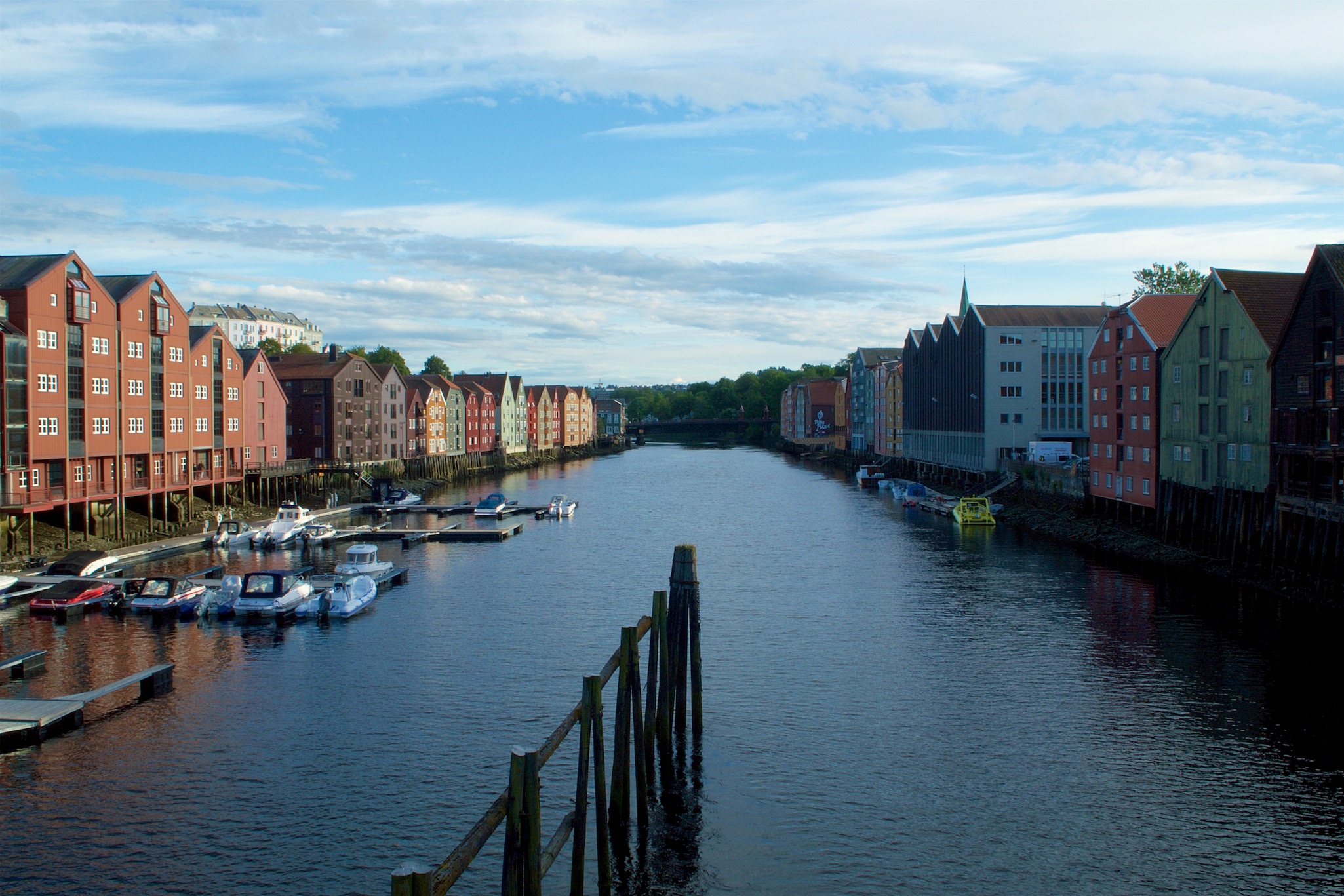 Colored wooden houses along the River Nidelven in Trondheim, Norway
